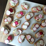 Herbed butter baguettes with radishes.