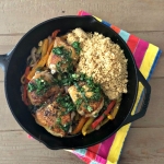 Crispy thighs with peppers and cous cous